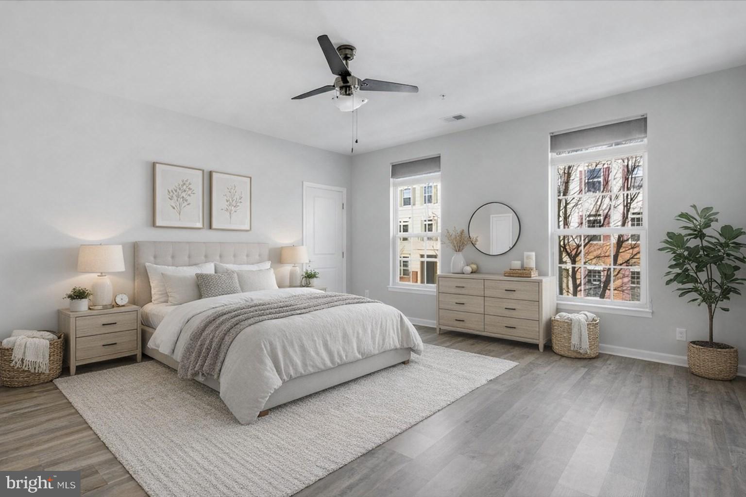 42143 Piebald Square Aldie, VA 20105 - Photo 20 of 34 a bedroom with a bed window and couch