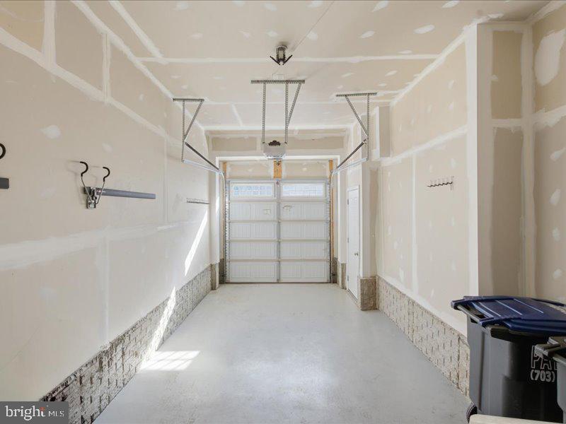 42143 Piebald Square Aldie, VA 20105 - Photo 32 of 34 a view of a garage