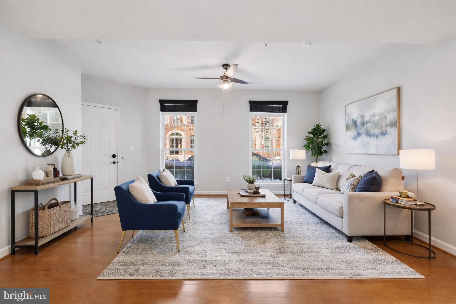 42143 Piebald Square Aldie, VA 20105 - Photo 7 of 34 a living room with furniture a rug and a window