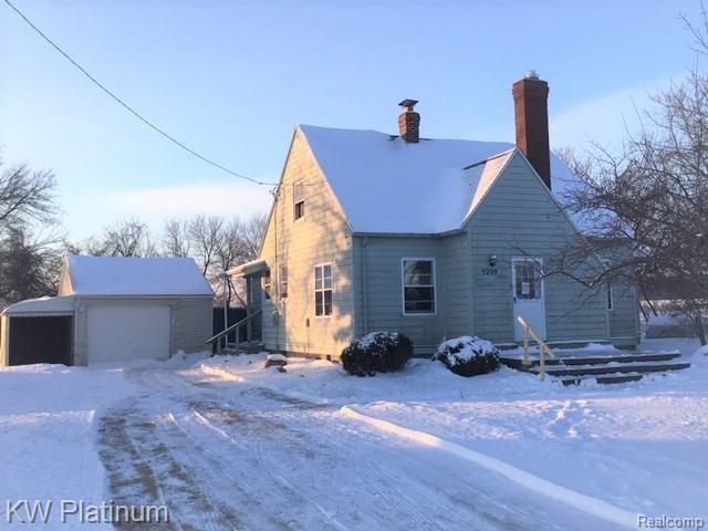 5209 McIntyre Road North Street, MI 48049 - Photo 1 of 26 new winter front view 1-30-2019.jpg