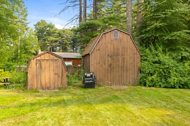 a backyard of a house with lots of green space