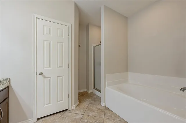 a bathroom with a bathtub