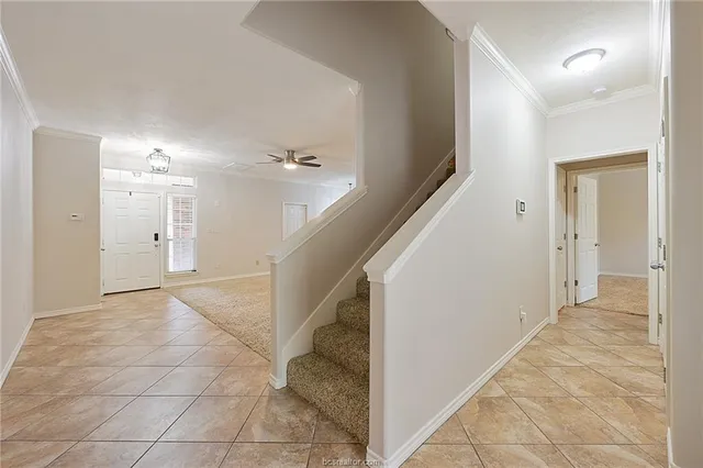 a view of an entryway with stairs