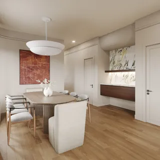 a living room with stainless steel appliances kitchen island a table chairs and wooden floor