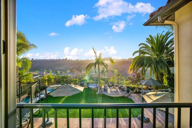 a bathroom with a double vanity sink toilet and shower