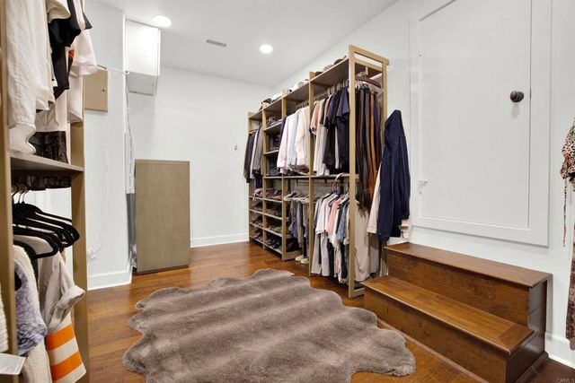 an aerial view of a house with yard swimming pool and outdoor seating