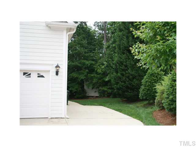 2600 Westmill Court Raleigh, NC 27613 - Photo 2 of 16 SIDE PARKING PAD
