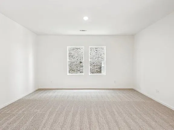 a view of a kitchen with wooden floor and a sink