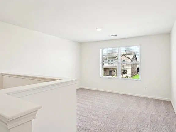 152 Mullen Way Taylor, TX 76574 - Photo 13 of 21 a view of an empty room with a window