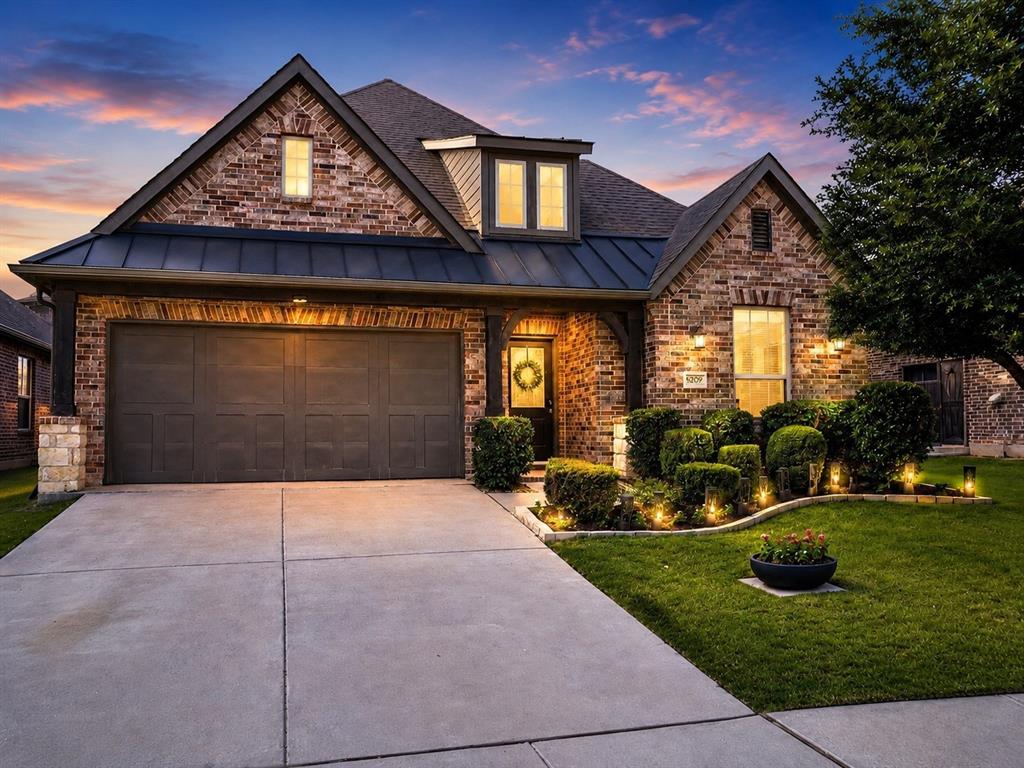 6209 Cupleaf Road Flower Mound, TX 76226 - Photo 1 of 29 Brick and stone facade featuring a prominent two-car garage