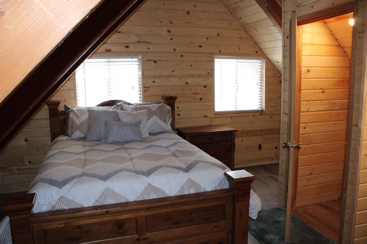 1140 Mountain View Road Arnold, CA 95223 - Photo 15 of 24 a bedroom with a bed and a window