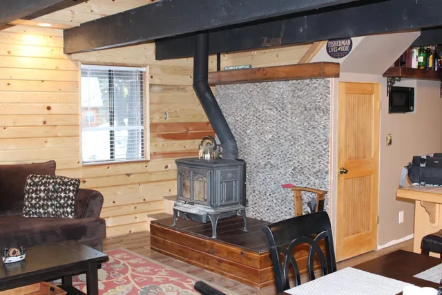 a living room filled with furniture and a table