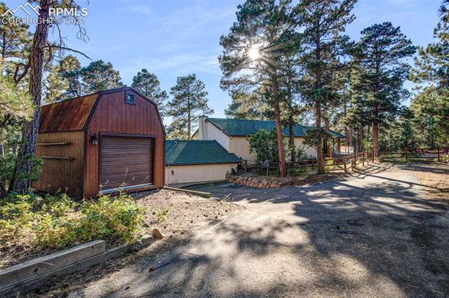 2480 Bricker Road Monument, CO 80132 - Photo 21 of 27 16x12 Storage shed/Shop that includes a Loft, Electricity and a 7Ftx8ft Door. Plenty of Parking for your RV and Toys