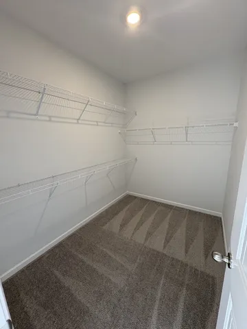a view of a room with racks on the wall