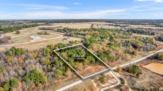 a view of a balcony with an ocean
