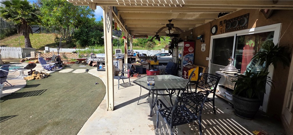 12 Franciscan Place Phillips Ranch, CA 91766 - Photo 6 of 16 Covered patio. Excuse the clutter!
