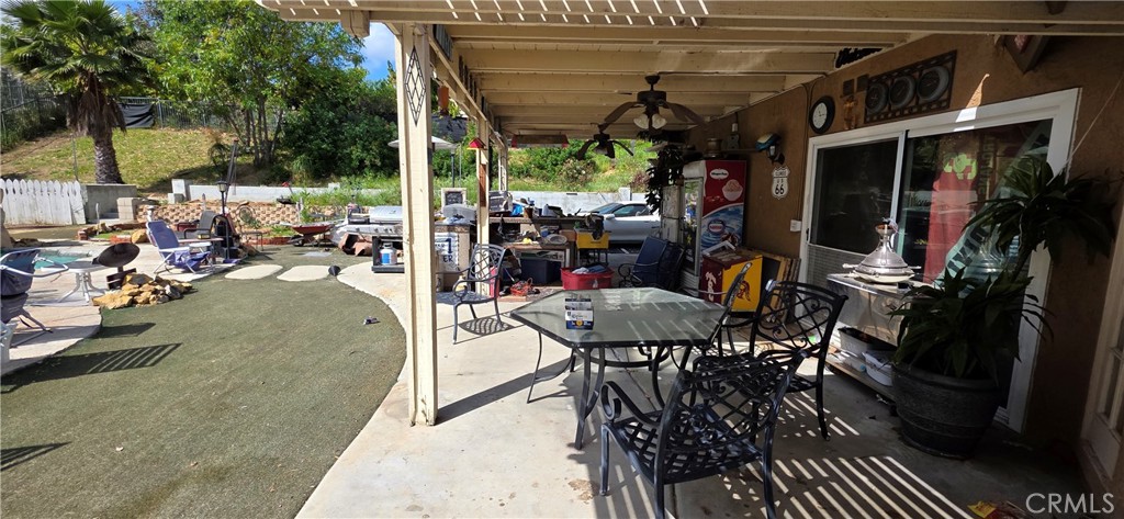 12 Franciscan Place Phillips Ranch, CA 91766 - Photo 6 of 16 Covered patio. Excuse the clutter!