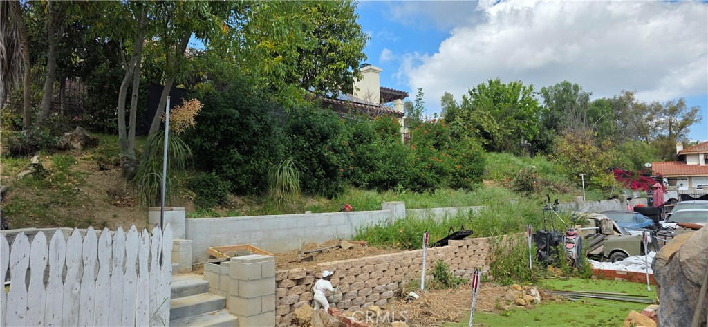 12 Franciscan Place Phillips Ranch, CA 91766 - Photo 10 of 16 Property goes up the slope. Appx 1/2 acre in total.