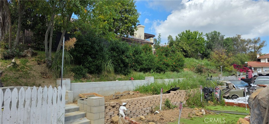 12 Franciscan Place Phillips Ranch, CA 91766 - Photo 10 of 16 Property goes up the slope. Appx 1/2 acre in total.