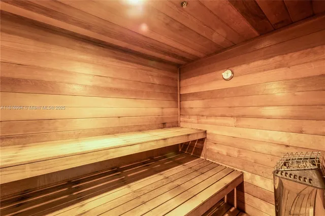 a view of a roof deck with wooden floor and fence