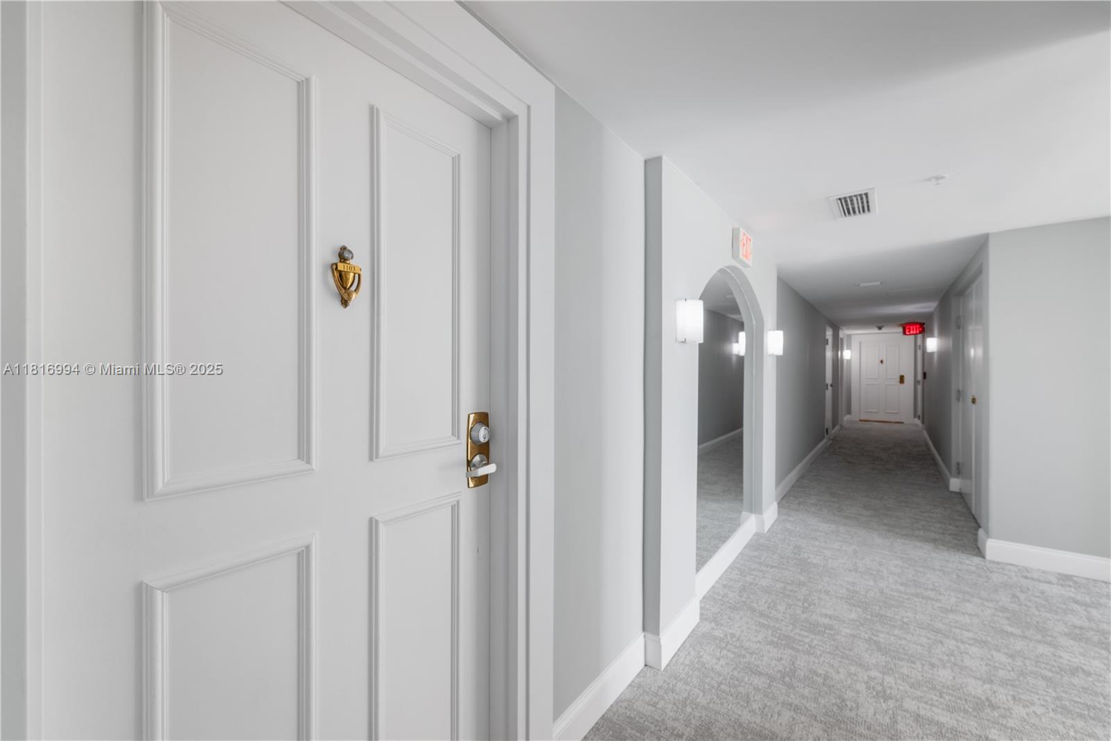 800 Claughton Island Drive, Unit 1103 Miami, FL 33131 - Photo 24 of 40 a view of a hallway with a hallway