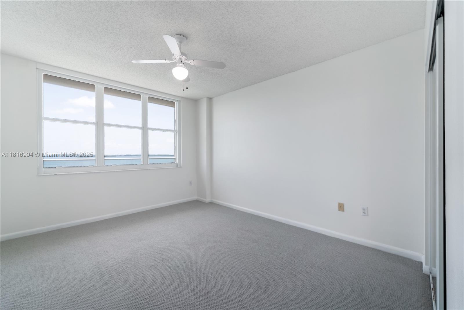 800 Claughton Island Drive, Unit 1103 Miami, FL 33131 - Photo 29 of 40 an empty room with a window