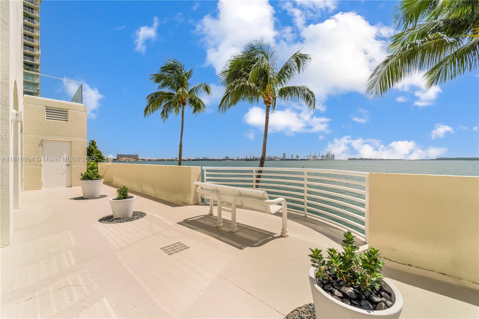 800 Claughton Island Drive, Unit 1103 Miami, FL 33131 - Photo 32 of 40 a view of a terrace with a potted plant