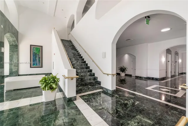 a view of a living room and dining room