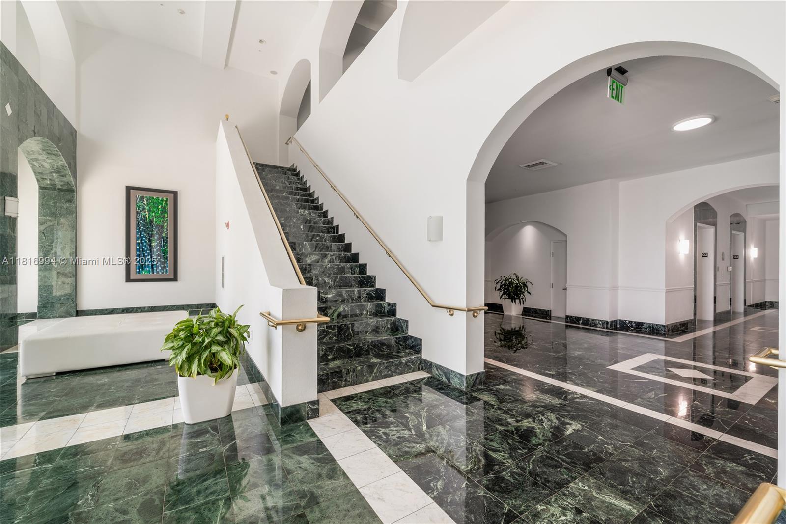 800 Claughton Island Drive, Unit 1103 Miami, FL 33131 - Photo 37 of 40 a view of entryway and hall with wooden floor