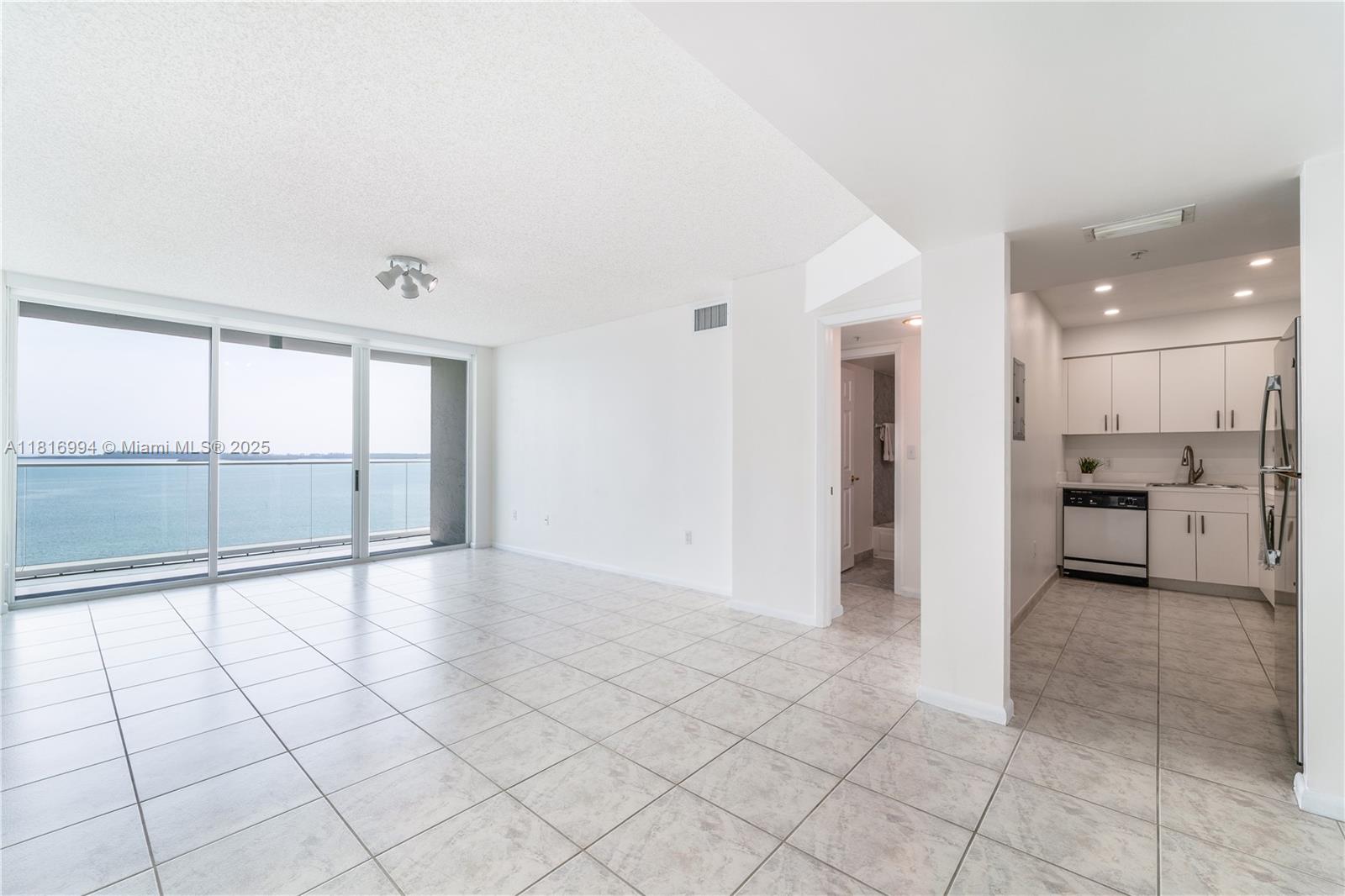 800 Claughton Island Drive, Unit 1103 Miami, FL 33131 - Photo 8 of 40 a view of a electric appliances and windows in a room