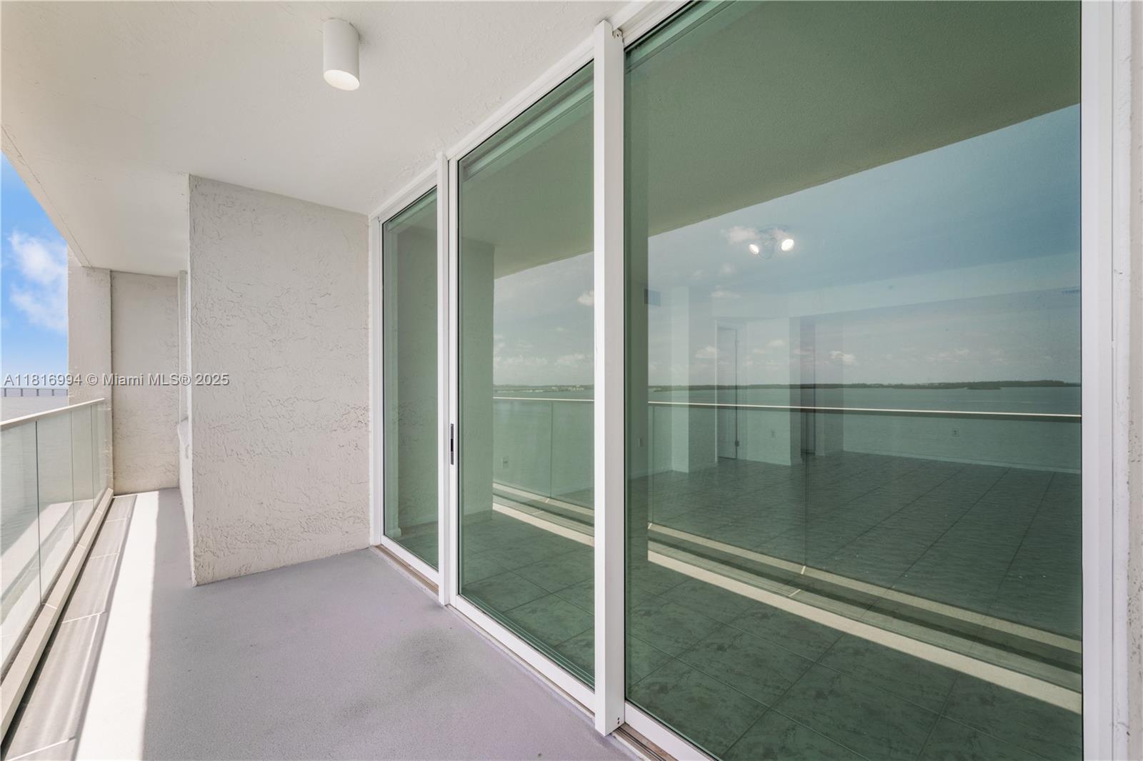 800 Claughton Island Drive, Unit 1103 Miami, FL 33131 - Photo 10 of 40 a bathroom with a shower