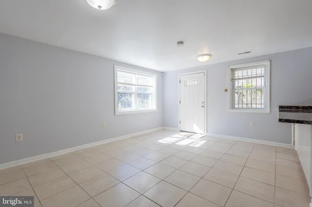 an empty room with windows