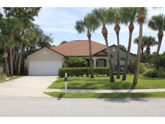 2513 Southern Melbourne, FL 32901 - Photo 1 of 12 a front view of a house with a yard