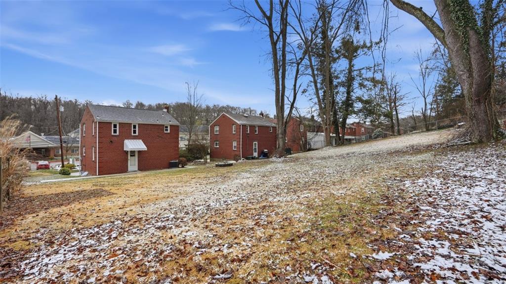 502 Weyman Road Pittsburgh, PA 15236 - Photo 32 of 39 a view of a house with a snow in the yard