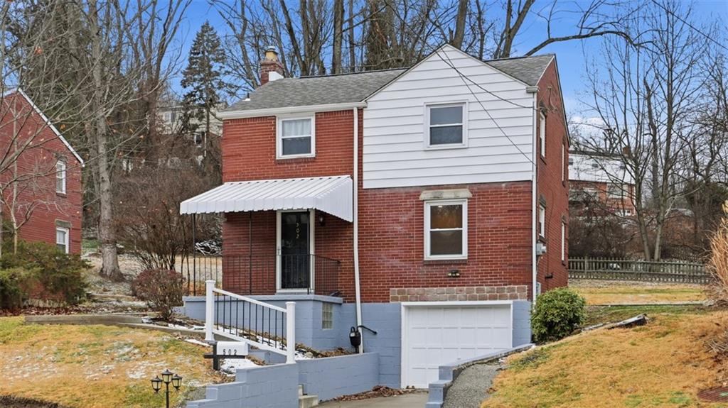502 Weyman Road Pittsburgh, PA 15236 - Photo 35 of 39 a front view of a house with a yard