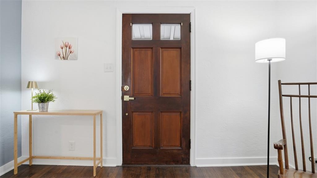 502 Weyman Road Pittsburgh, PA 15236 - Photo 5 of 39 an entryway with wooden floor and a potted plant