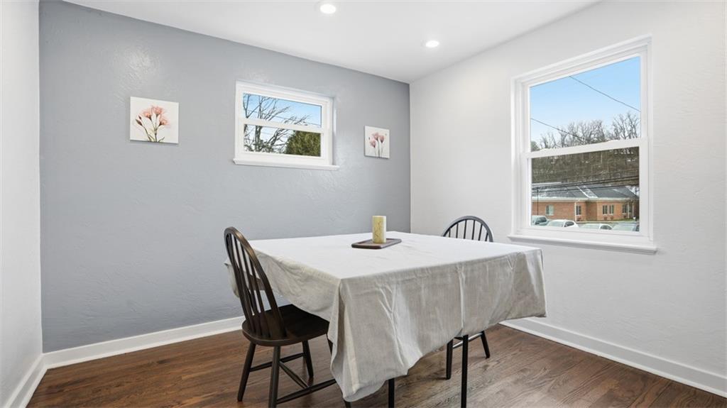 502 Weyman Road Pittsburgh, PA 15236 - Photo 9 of 39 a view of a dining room with furniture and wooden floor