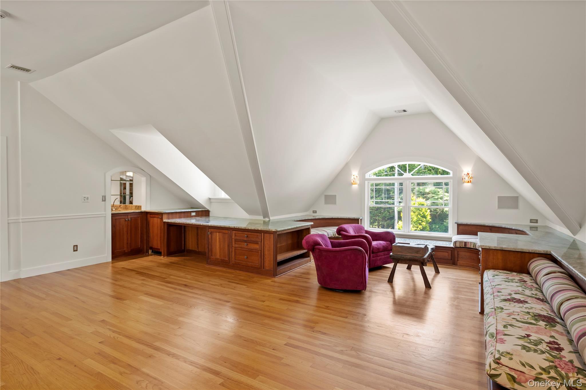 4745 North Bayview Road Southold, NY 11971 - Photo 12 of 31 Additional living space featuring light wood-style flooring and lofted ceiling