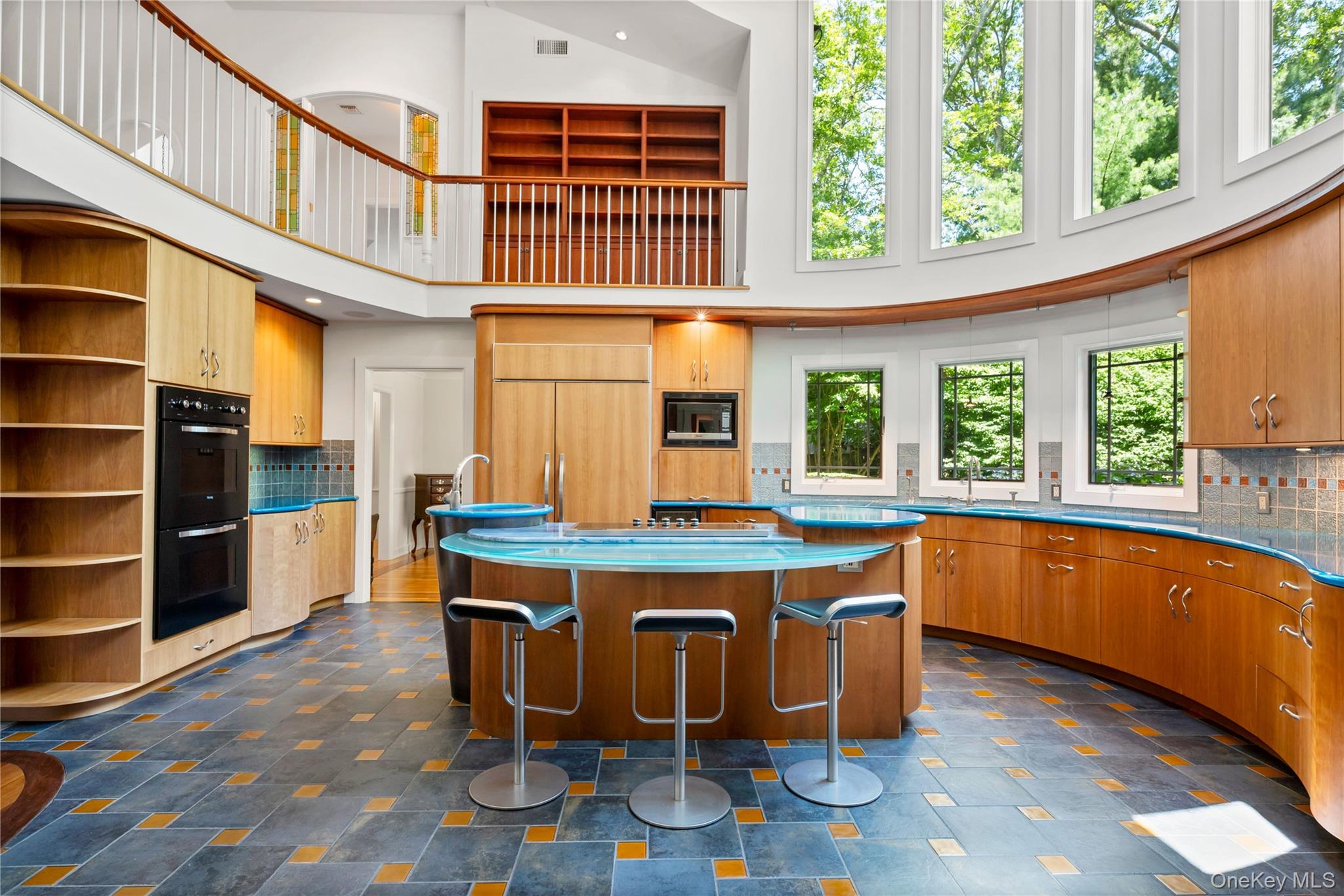 4745 North Bayview Road Southold, NY 11971 - Photo 4 of 31 Kitchen with black appliances, a towering ceiling, decorative backsplash, a kitchen island, and open shelves