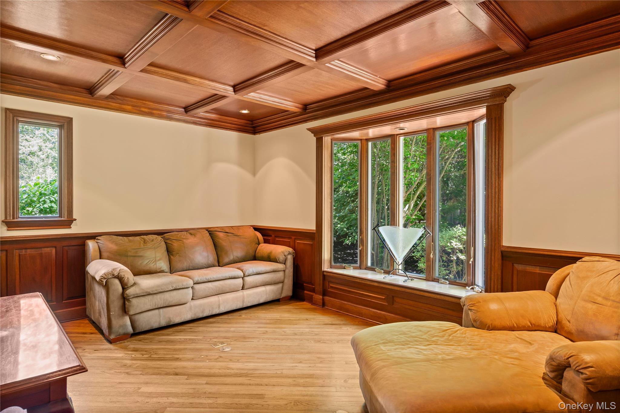 4745 North Bayview Road Southold, NY 11971 - Photo 8 of 31 Living room with coffered ceiling, a wood ceiling with exposed beams, light wood-style floors, and ornamental molding