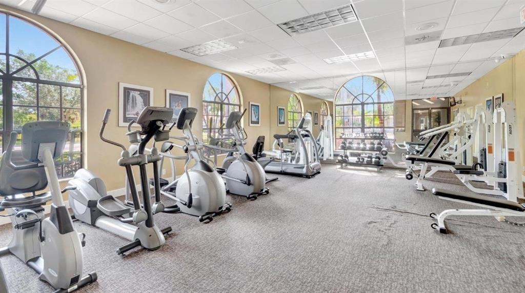 1520 Windorah Way, Unit E West Palm Beach, FL 33411 - Photo 9 of 12 a view of a room with gym equipment