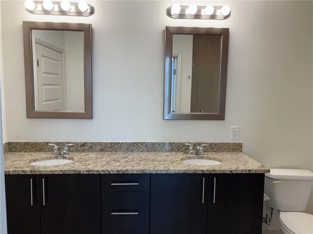 a bathroom with a sink and a toilet