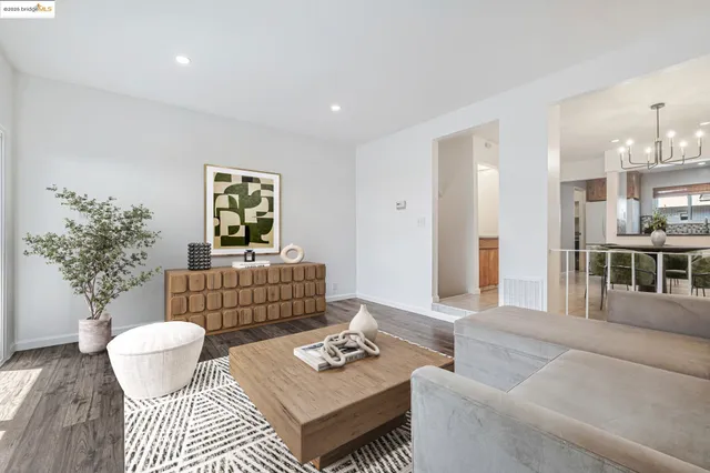 a living room with furniture and a table