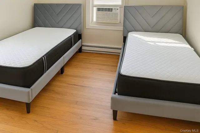 a living room with a bed and a couch