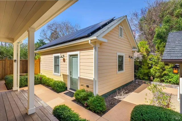a bathroom with a sink a vanity and a shower