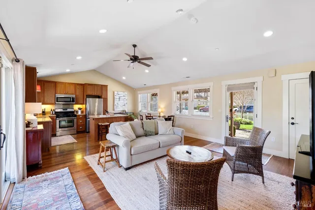 a bathroom with a sink vanity tub and a mirror