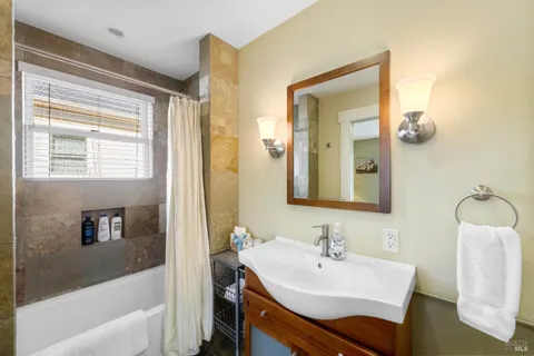 a view of a chair and table in the patio