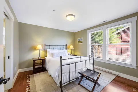 a view of a dinning table and chairs in patio
