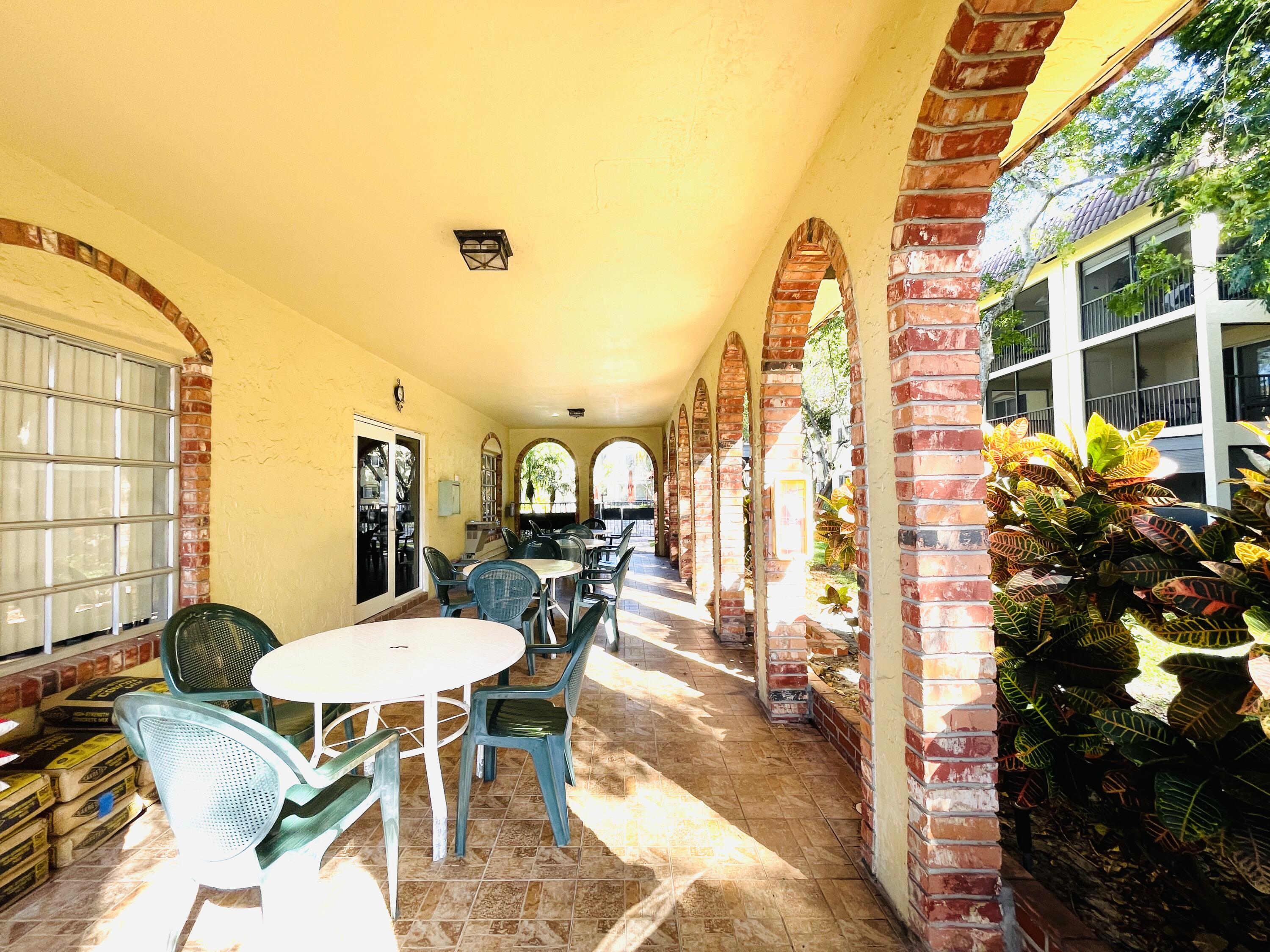 257 South Cypress Road, Unit 442 Pompano Beach, FL 33060 - Photo 25 of 37 a outdoor space with furniture