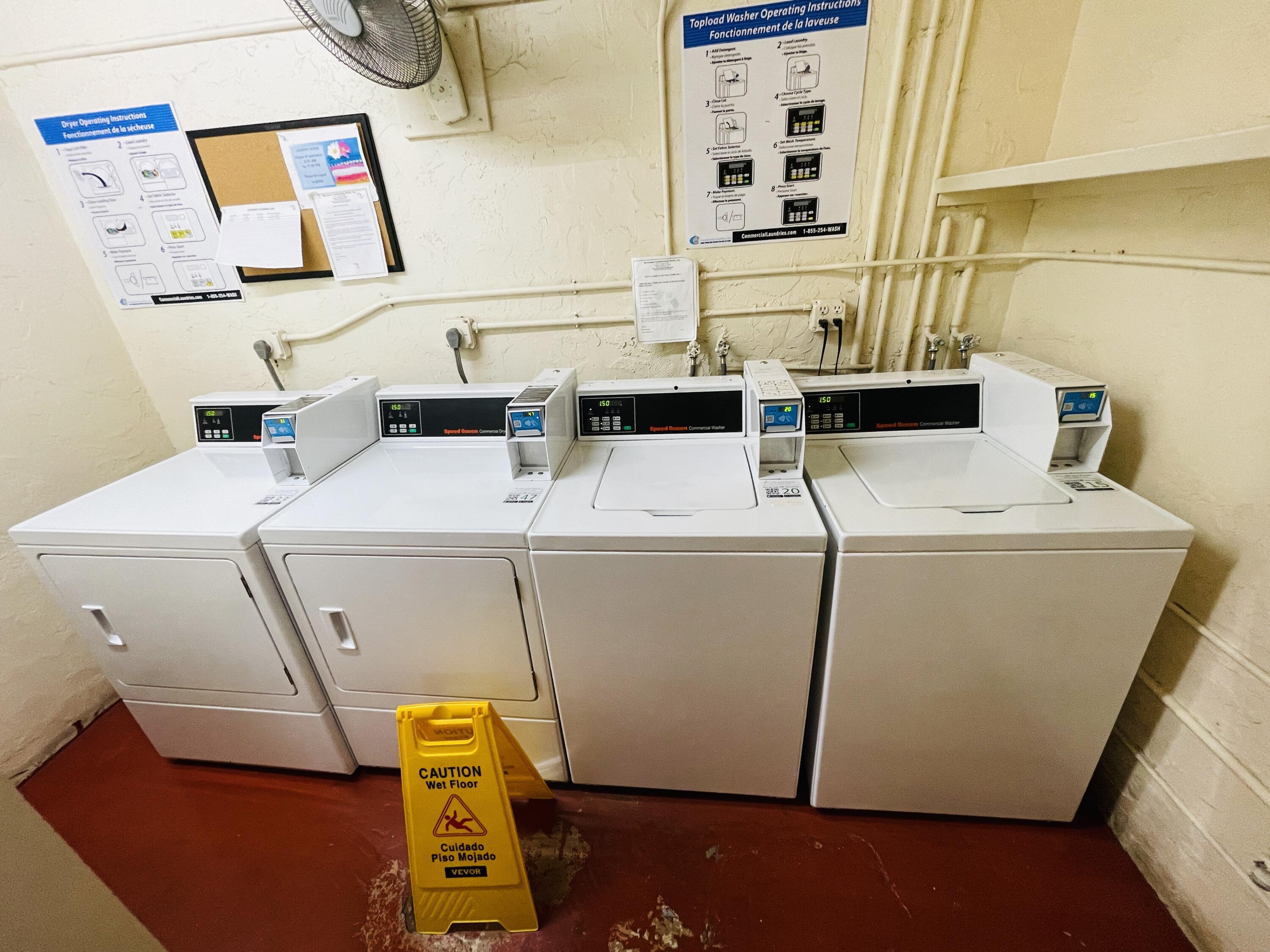 257 South Cypress Road, Unit 442 Pompano Beach, FL 33060 - Photo 33 of 37 a utility room with dryer and washer